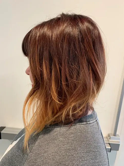 Burnt Amber Melt blends rich auburn roots into warm copper ends, creating soft dimension, beautiful (..)