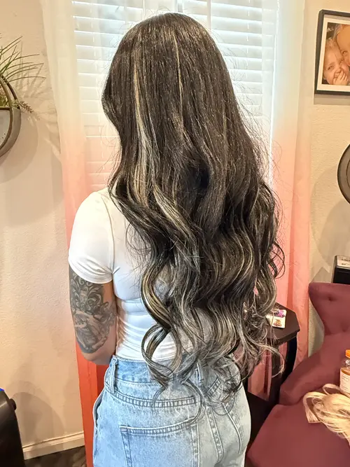 This smoky brunette was created to blend depth with cool silver ribbons instead of covering everythi(..)